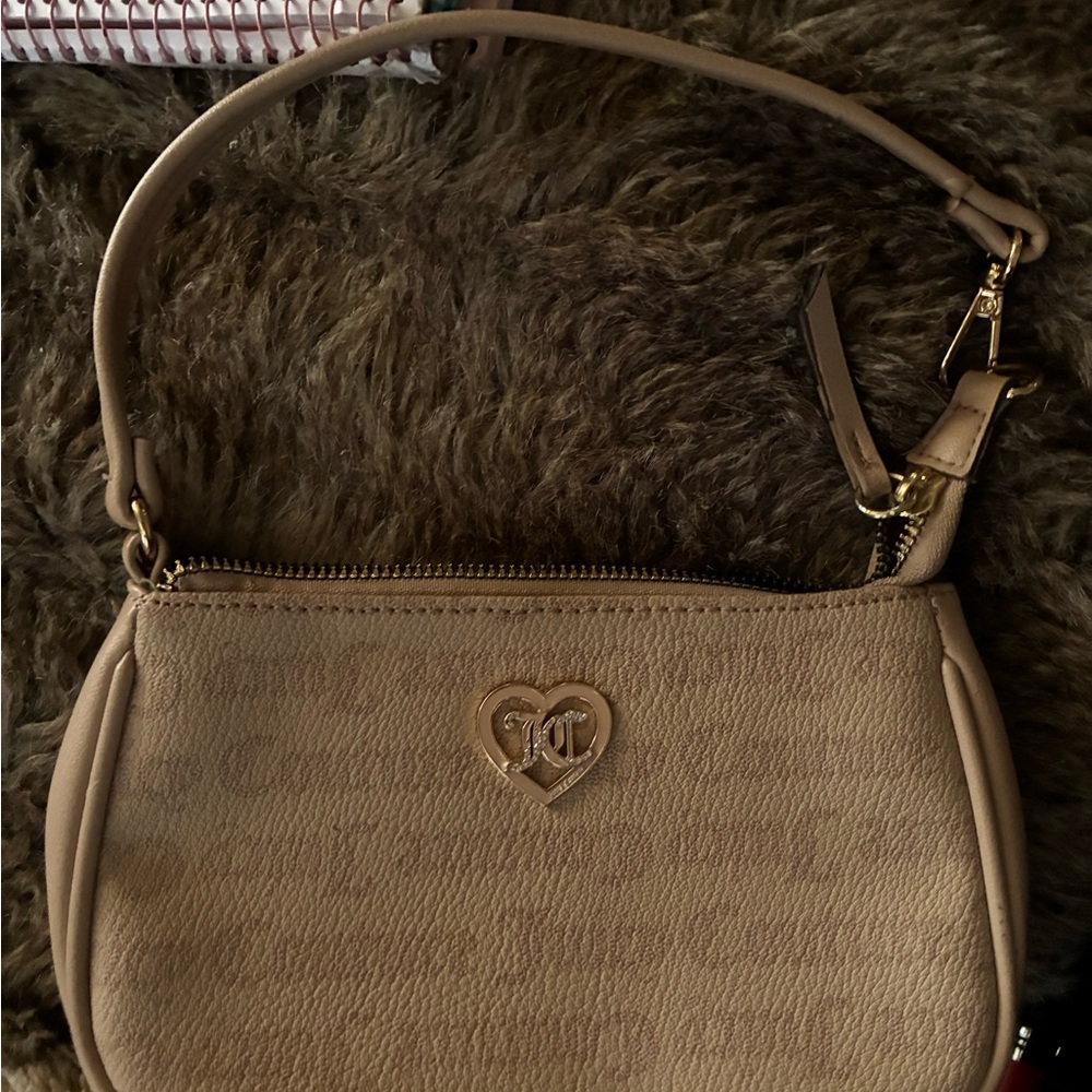 Juicy Couture Tan Wristlet with Heart Emblem